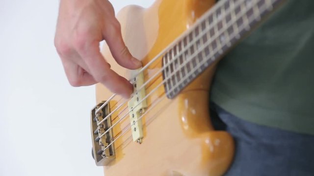 Bass guitarist begins to play the song