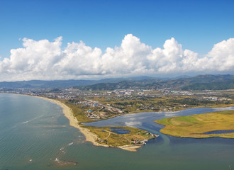 View on town Nakhodka and estuary of river Partizanskaya from top of the mountain