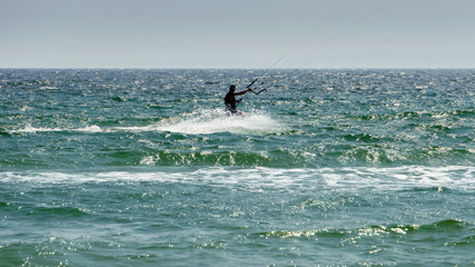 sky surfers train in stormy waters
