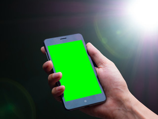 smart phone on Lens flare of strong light source in the dark