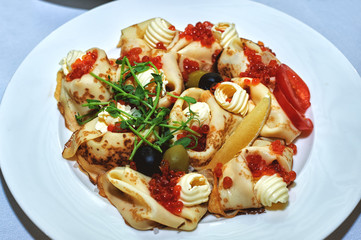Pancakes with red caviar . Russian traditional food