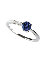 gemstone and diamond sapphire ring isolated on white