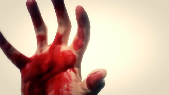 Waving nightmare: a bloody hand appears and tries to grab the viewer. Long take.

