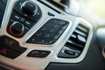 Car radio and phone system,Button on dashboard in car panel