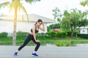 Asian woman stretching body for warm up before jogging,lifestyle of woman love heathy
