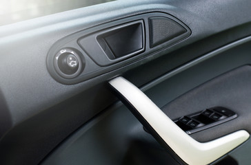 Fototapeta premium Door handle inside the car,Button locking doors