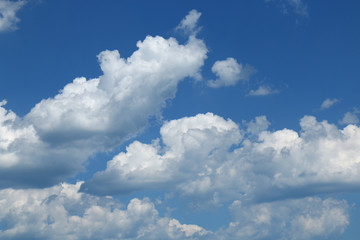Naklejka na ściany i meble Blue sky with clouds background, sky with clouds.