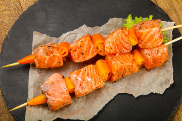 Raw salmon skewer