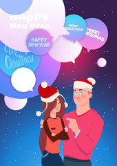 Man And Woman Embracing Over Chat Bubbles With Merry Christmas And Happy New Year Messages Holiday Card Design Flat Vector Illustration