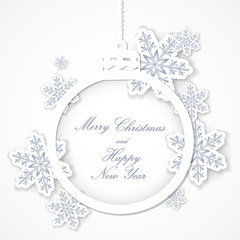 Christmas ball cut out of paper with snowflakes. Greeting card or invitation. Merry Christmas and a happy new year. Element for design.