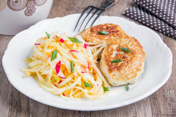 Chicken cutlets with cabbage salad coleslaw, tasty healthy lunch for children, diet, light summer dish