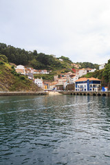 Fototapeta na wymiar View from water to Cudillero, small fishing village in Asturias, Spain. 