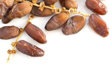 Date palm healthy fruit on white background