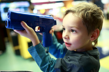 Kid playing a shooter