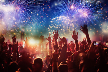 cheering crowd watching fireworks - new year concept © Melinda Nagy