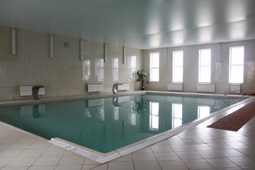 Fototapeta na wymiar Swimming pool in resort sanatoriums. Indoor swimming pool in the sanatorium of the resort
