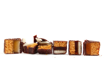 cut chocolate marzipan on white background