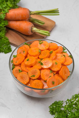 Chopped carrot slices. Fresh raw peeled carrot slice in bowl.