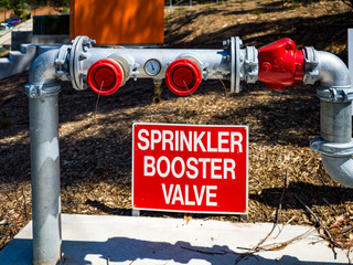 Fire sprinkler booster valve