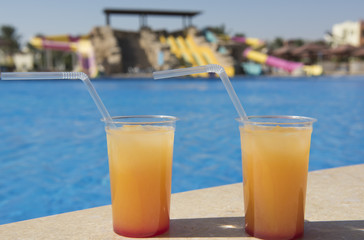 Cocktail drinks by a swimming pool