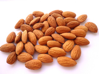 Almonds,dried fruits, white background