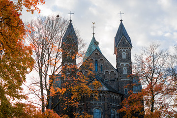 Church in fall trees