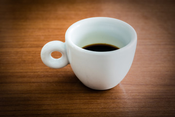 Coffee cup on a wooden table