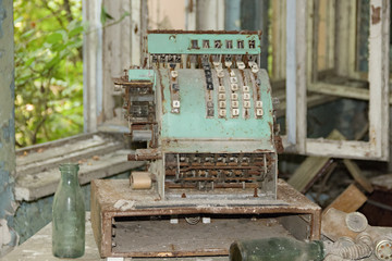 Fototapeta na wymiar Destroyed sales register machine