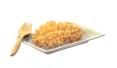 Crispy Lotus Blossom Cookie in dish on white background