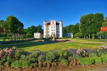 Fototapeta na wymiar Neo-Gothic style palace surrounded by an English landscape garden in Wojanow, Poland