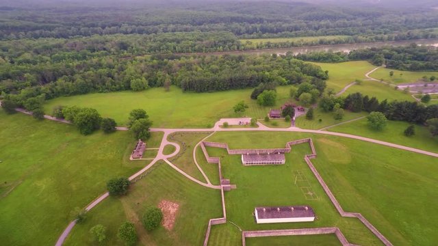 Aerial view of the Fort Frederick barracks with the Calvert Arms flag waving in the breeze.