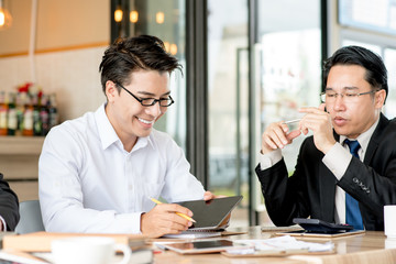 Businesspeople discussing together in conference room during meeting at office