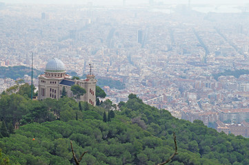 Tibidabo. Beautiful view of Barcelona from the mountain of Tibidabo. The city is surrounded by forest and nature.