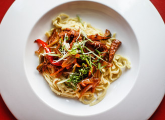 Tasty pasta with mushrooms and sauce
