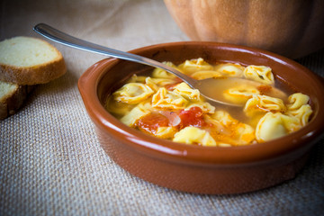 Italian Traditional Food Called Tortellini In Brodo With Bread