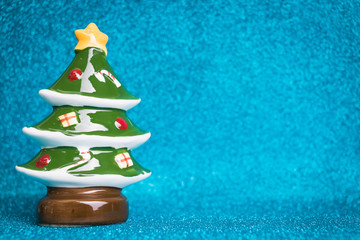 Pine tree on sparkling background.  Christmas seasons celebration concept