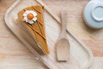 Thai tea cake with small wooden spoon