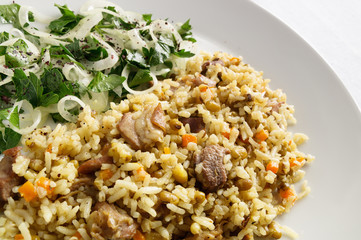 rice, mung bean, and mutton pilaf with onion salad 