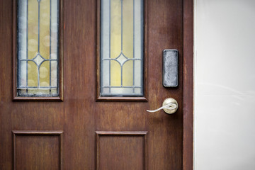 steel handle wood door in the city