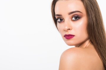 Obraz premium Beauty Woman Portrait. Professional Makeup for Brunette with Blue eyes - Red Lipstick, Smoky Eyes. Beautiful Fashion Model Girl. Perfect Skin. Make up. Isolated on a White Background.