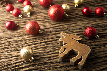 wood reindeer wood with gloss decor ball in christmas concept