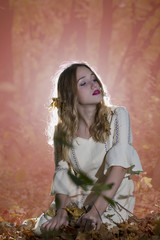 Fototapeta premium Fantasy Fairy Tale Forest , young woman posing as nymph