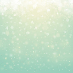 Christmas winter abstract background with snowflakes, bokeh lights and place for text. Christmas New Year's wallpaper