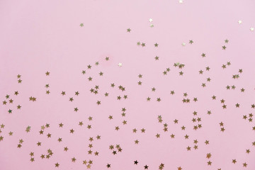 sparkling stars on a pink background
