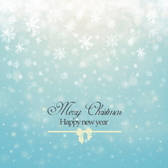 Christmas winter abstract background with snowflakes, bokeh lights and congratulations. Place for text. Christmas New Year's wallpaper