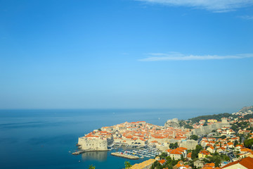 Fototapeta na wymiar A view of the old town of Dubrovnik with the sea port in Croatia. 