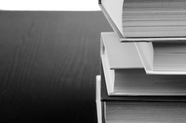 a pile of books, still life of a pile of books in black and white. culture. education.