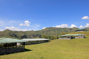 Protective roofs over ancient tombs, National Archeological Park of Tierradentro UNESCO World Heritage Site, Colombia, South America