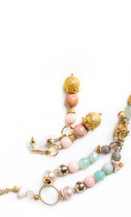 gold jewerly braslete with semiprecious at white background