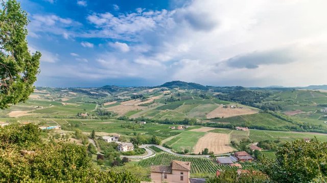 view of green summer valley of italian coyntryside timelapse with hills on background